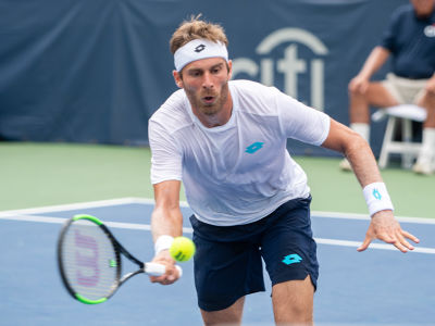 Norbert Gombos hits a volley during his second round Citi Open match. — 2019 Citi Open — Citi Open, 2019 Citi Open, Tennis