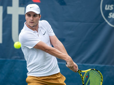 Miomir Kecmanovic hits a backhand during his 2019 Citi Open second round match. — 2019 Citi Open — Citi Open, 2019 Citi Open, Tennis