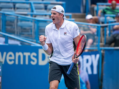 John Isner reacts to breaking Hubert Hurkacz's serve during the 2019 Citi Open. — 2019 Citi Open — Citi Open, 2019 Citi Open, Tennis