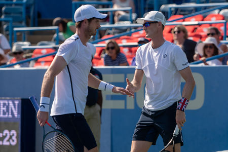 Andy Murray and Jamie Murray talk strategy during their first round doubles match at the Citi Open. — 2019 Citi Open — Citi Open, 2019 Citi 