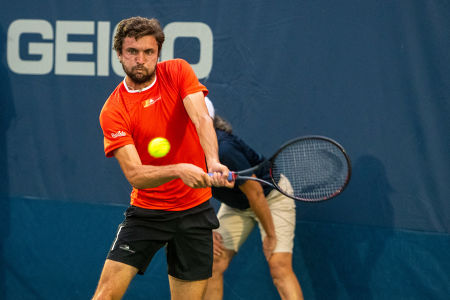 Gilles Simon hits a backhand during his 2019 Citi Open second round match. — 2019 Citi Open — Citi Open, 2019 Citi Open, Tennis