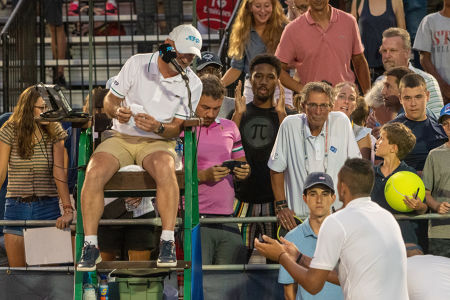 Nick Kyrgios talks to chair umpire Fergus Murphy after winning his second round Citi Open match. — 2019 Citi Open — Citi Open, 2019 Citi Ope