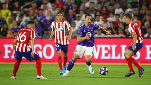 Zlatan Ibrahimovic takes on Marcos Llorente of Athletico Madrid — soccer — MLS, soccer, allstar