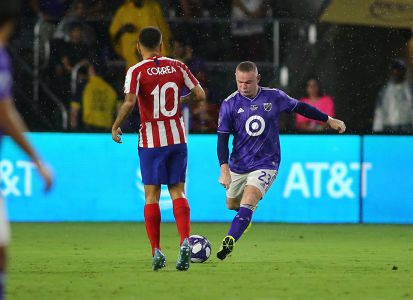 Wayne Rooney lines up a shot against Athletico Madrid — soccer — MLS, soccer, allstar