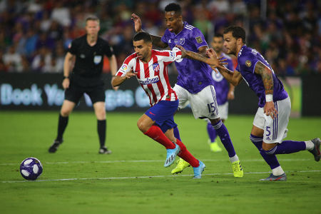 Leandro González Pirez chases an Athletico Madrid player — soccer — MLS, soccer, allstar