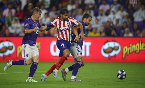 Diego Costa fights past Bastian Schweinsteiger to shoot — futbol — MLS, soccer, allstar