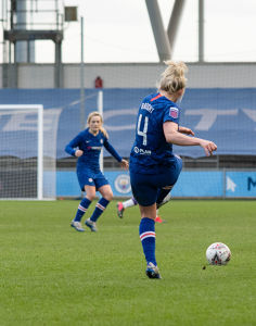 Millie Bright passes the ball to Erin Cuthbert during Manchester City Women vs Chelsea Women in the 2020 FA Women's Super League — Chelsea W